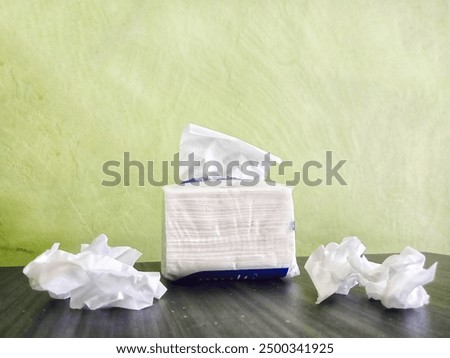 tissue, tissue on the table with a green background