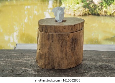 Tissue Paper In A Wooden Box, Placed On A Wooden Table Beside The Ditch.