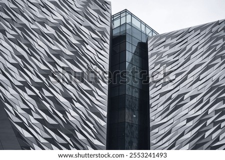 The Titanic Belfast Museum features an angular, ship-like design with reflective surfaces. Its bold architecture stands on the historic waterfront, paying tribute to the Titanic's legacy and engineeri
