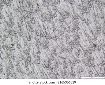 Titanium Surface Under The Microscope. Metal Surface. Surface Treatment.