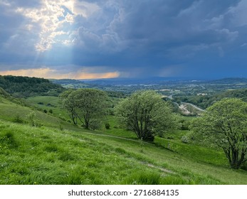 #,Title
1,Dramatic Sun Rays Valley
2,Stormy Sky Green Hills
3,Sunbeams Over Rolling Landscape
4,Moody Valley God Rays
5,Lush Hills Dramatic Light
6,Crepuscular Rays Countryside View
7,Storm Clouds Sunburst Valley
8,Green Meadow Dramatic Sky
9,Atmospheric Hills Light Beams
10,Tranquil Valley Storm Light