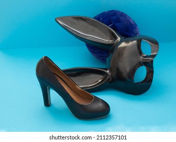 Title	
Black Mask And Black Shoe And Blue Background.	Sustainable Fashion  And Party Concept
