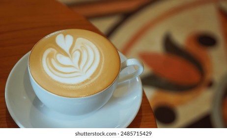 Title White cup of coffee with latte art suitable for coffee shop menu, social media posts, cafe advertisements, food blogs. - Powered by Shutterstock