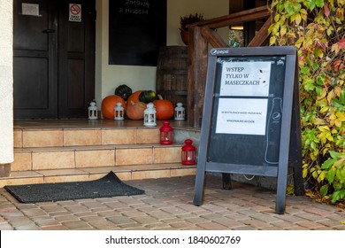 Tlen, Poland - October 23, 2020: Front Of Restaurant With Information Board About Covid Epidemic Rules: Enter Only With Masks, Maximum 40 People Inside.