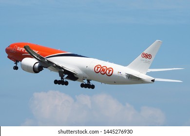 TNT Cargo Boeing 77F Reg. OO-TSA departing Hong Kong - Chek Lap Kok Airport with the nice weather on 17 July 2016