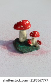 Toadstools Made Of Painted Pebbles