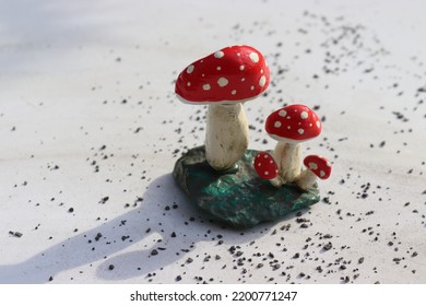 Toadstools Made Of Painted Pebbles