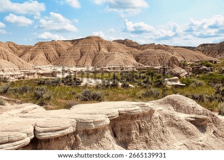 Toadstools with a View of the Badlands, Toadstool Geologic Park in the Oglala National Grassland in Nebraska.