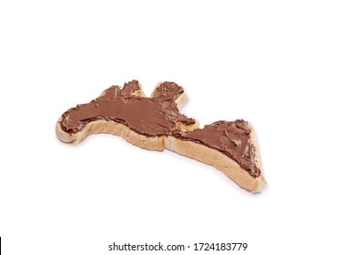 Toast bread in the form of the american continent with chocolate spread isolated on a white background