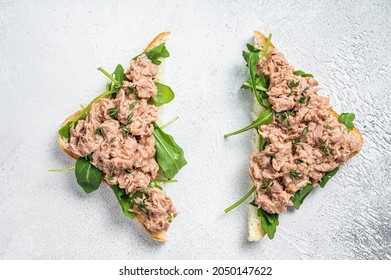 Toast With Canned Tuna Fish And Arugula. White Background. Top View