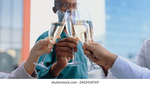 Toast, Champagne in hands and glasses to celebrate and business people outdoor for success together and corporate achievement. Cheers, alcohol drinks and winning at office with support and teamwork - Powered by Shutterstock