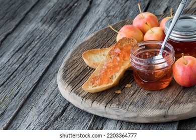 Toast With Crab Apple Jelly On A Rustic Board With Copy Space To The Left