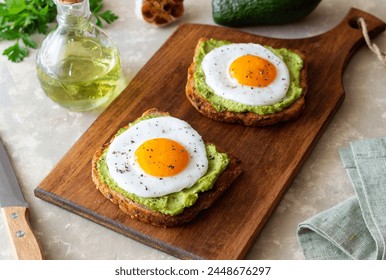 Toast with guacamole and eggs. Healthy eating. Breakfast - Powered by Shutterstock