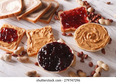 Toast With Peanut Butter And Jelly Close-up On The Table. Horizontal 