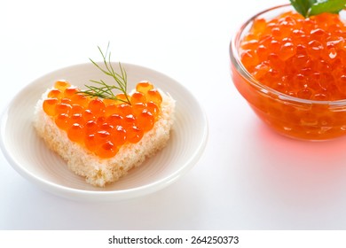 Toast With Red Caviar In Heart Shape