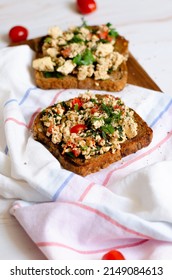 Toast With Scramble Tofu And Herbs Parsley Green Onion Vegan Breakfast Lunch Meal Linen Napkin Marble Background