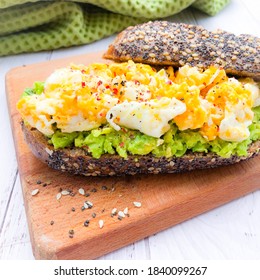 Toast With Scrambled Eggs And Avocado