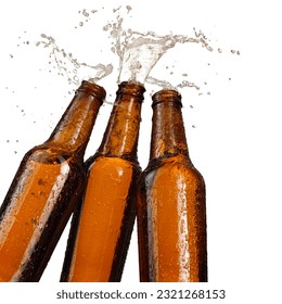 Toast of three brown beer bottles with beer up and splash on white background - Powered by Shutterstock