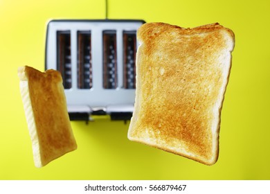 Toast Or Toasted Bread Popping Up From The Toaster