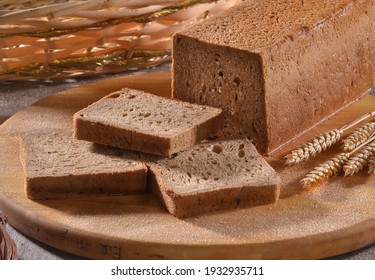 toast wheat integral bread sliced on rustic background. - Shutterstock ID 1932935711