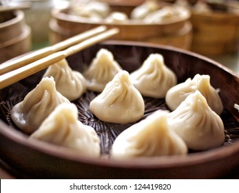 Toasted bao buns lined up - Shutterstock ID 124419820