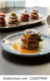 Toasted bread, vegetables and egg on a plate.