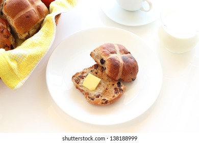 Toasted Hot Cross Buns With Butter On Plate