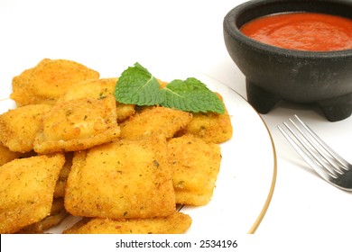 Toasted Ravioli On Plate W/sauce