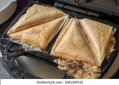 A Toasted Sandwich In A Toasted Sandwich Maker.