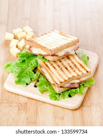 toasted sandwiches on salad leaf