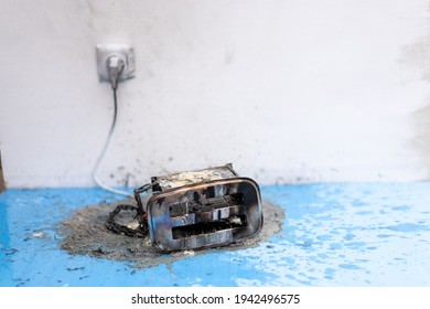 Toaster After Fire. Household Electrical Appliance Fire Hazard. Overload. Short Circuit. Carelessness. Safety In Home. Danger Home Inflammation Insurance Concept