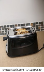 Toaster Waffles. Breakfast Waffles Being Toasted In A Kitchen Toaster. Hot Toasted Pancakes Or Waffles For Breakfast Or A Snack.