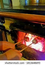 Toasting Marshmellows On A Peat Stove