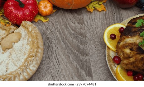 toasting with wine glasses in front of chicken dinner, pour wine, festive dinner at home. chicken. pie, fruits, grapes, apples, pumpkin. Roasted Turkey. Thanksgiving table served . Christmas dinner. - Powered by Shutterstock