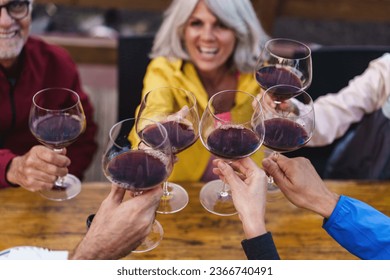 Toasting Wine Glasses on Terrace - Close-up of wine glasses toasting on an outdoor terrace wine bar, embodying wine appreciation and the warmth of shared moments. - Powered by Shutterstock