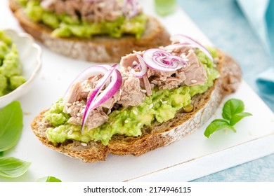 Toasts With Canned Tuna And Avocado Guacamole. Healthy Food, Diet Breakfast