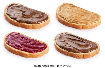 Toasts with chocolate butter, peanut butter and  berry jam isolated on white background. With clipping path. - Shutterstock ID 1574149153
