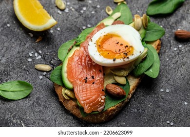 Toasts Whole Grain Bread With Avocado Paste And Salmon. Keto Paleo Diet. Delicious Breakfast Or Snack. Long Banner Format. Top View.