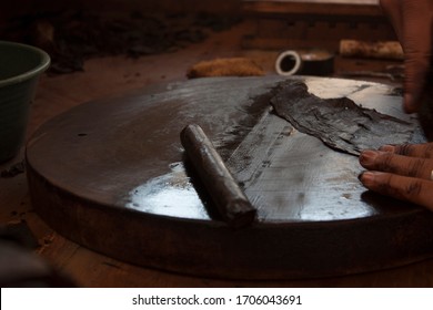 Tobacco Factory Process And Scene With Tools For The Confection Of Cigars In Mexico City And Hands Of Man Working