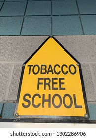 Tobacco Free School Sign At Entrance Of Elementary School