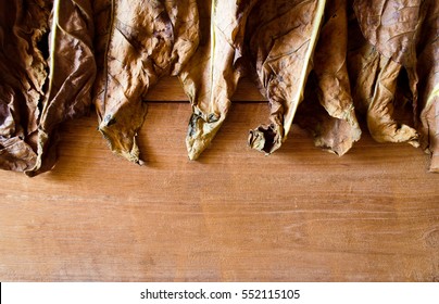 Tobacco leaves on wooden.