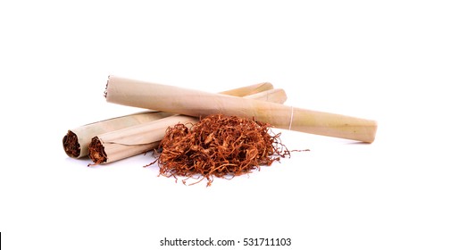 Tobacco pile and cigarette on white background