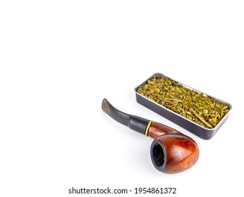 Tobacco pipe and snuff box on a white background. Wooden pipe for smoking. Tobacco in a snuffbox. Smoker's tool. Smoking is a bad habit. Smoker addiction. Nicotine. White background.