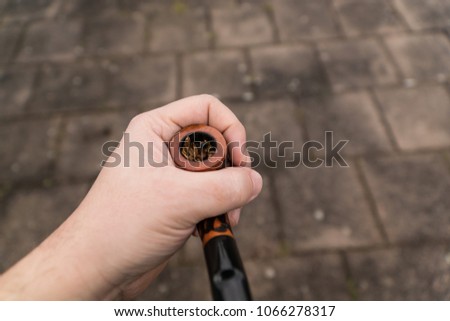 tobaco pipe in a hand