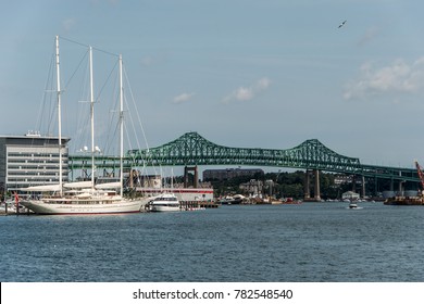 Tobin Bridge In Boston MA, USA And The Athena 295 Foot Yacht Docked At The Boston Harbor