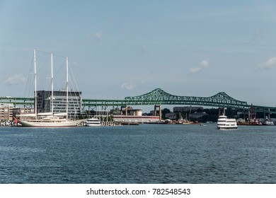 Tobin Bridge In Boston MA, USA And The Athena 295 Foot Yacht Docked At The Boston Harbor