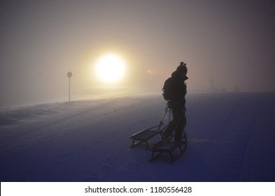 Tobogganing In Austria At Night