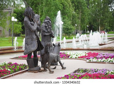 TOBOLSK, RUSSIA - JULY 30, 2008: Monument To Robinson Crusoe, Friday And Dog Laika. The Monument To The Heroes Of The Novels By Daniel Defoe Was Unveiled In 2007.