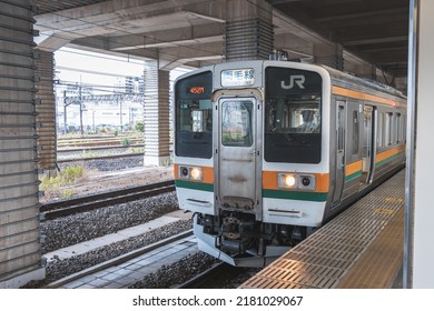 Tochigi, Japan - 06.2022: Ryomo Line JR East 211 Series EMU Train Making Stop At Oyama Station To Pick Up Passenger