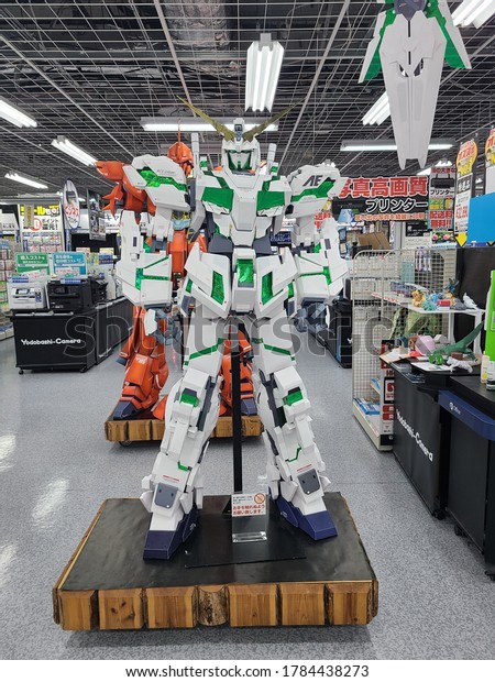 Tochigi,\
Japan - July 7, 2020 : Paper robot at the\
store.